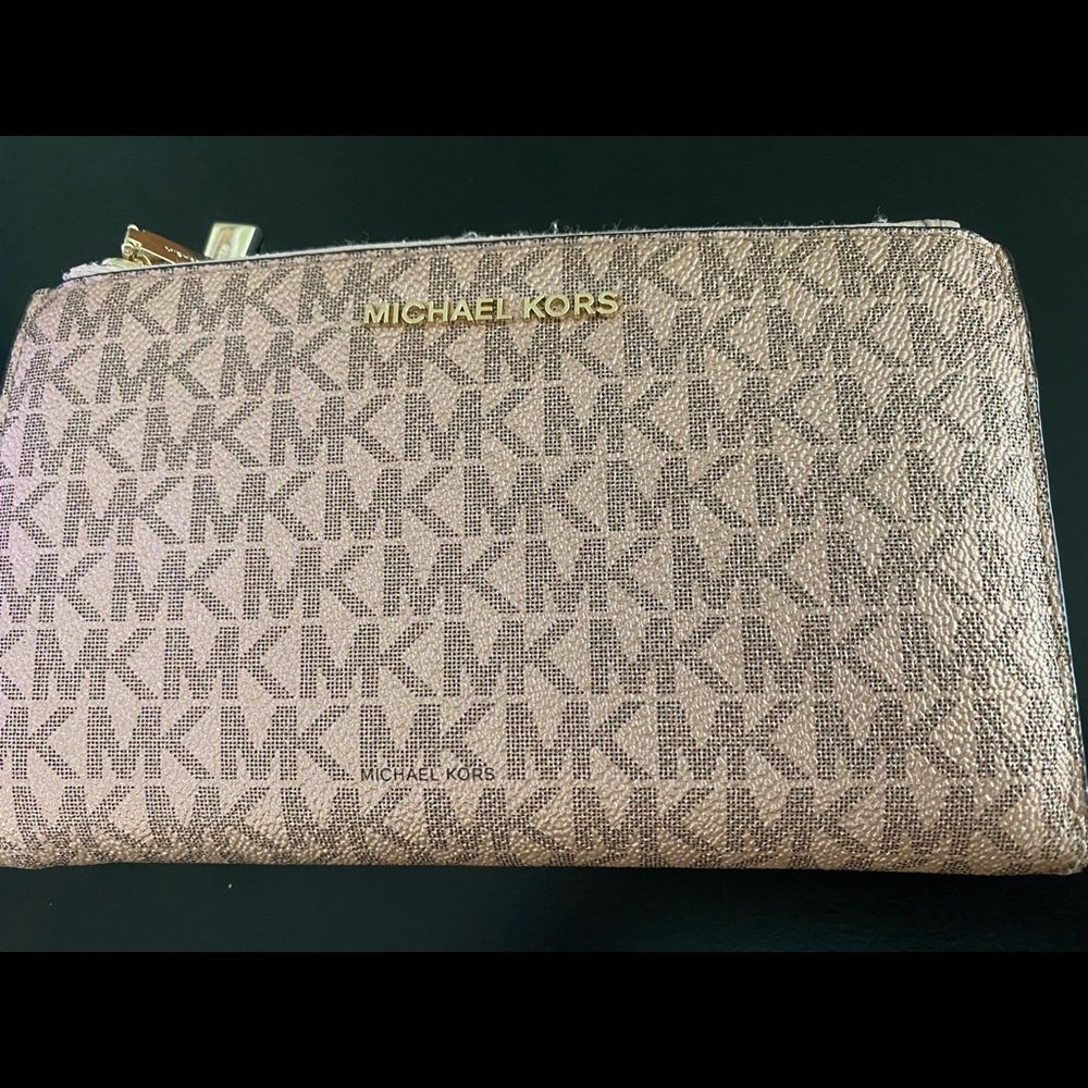 Rose gold Michael Kors wristlet